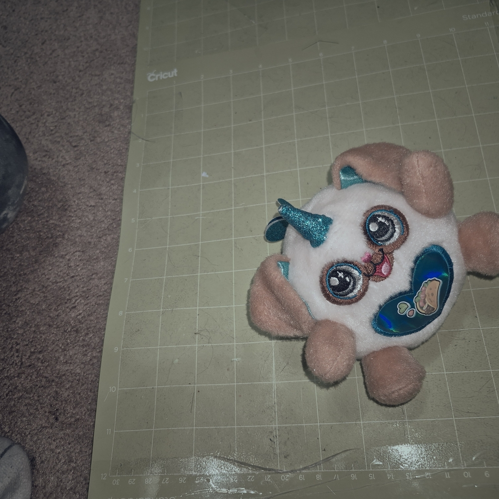 Cricut Stuffed Animal with Blue and Brown Accents